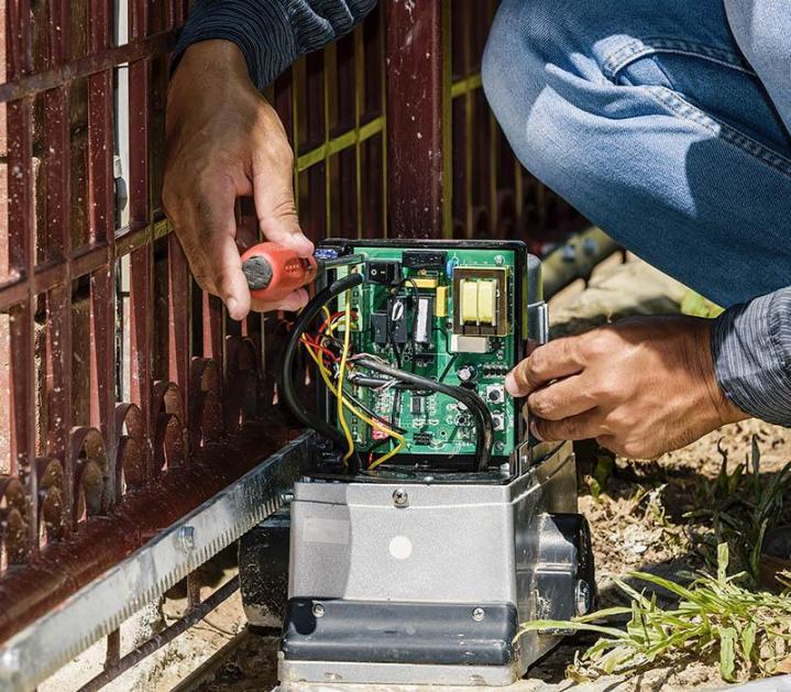 Keep Your Gate Running Smoothly: Gate Motor Service by AA Garage Doors Services.